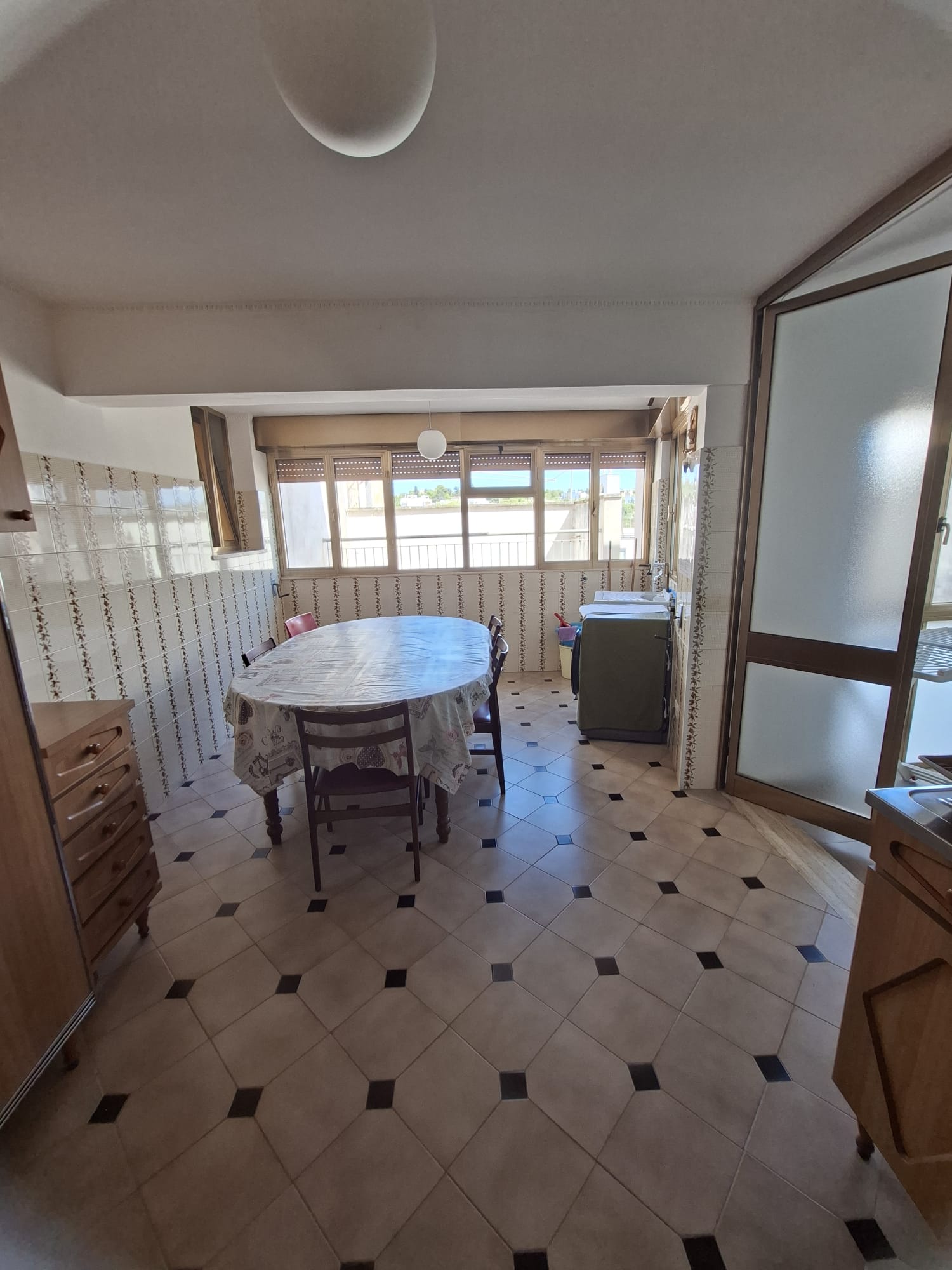 The second-floor open kitchen